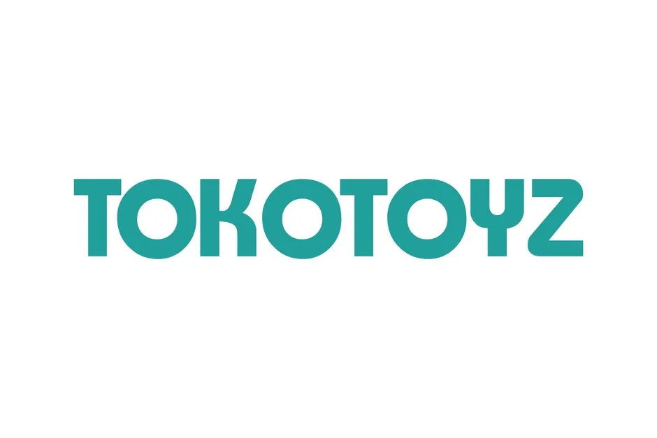 白地に、青緑色の文字で「TOKO TOYZ」と書かれたロゴ画像。