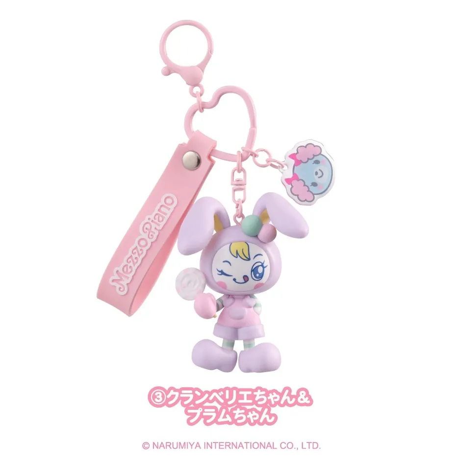 ピンク色のキーホルダー。ウサギのキャラクターが描かれており、Mezzo Pianoのロゴが入っている。